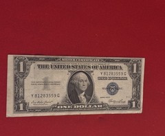 $1 ERROR 1935-E (SILVER CERTIFICATE) MISCUT ERROR – Misaligned print