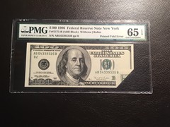 100.00 FRNote 1996 Error Printed Fold PMG 65 EPQ Here’s one you don’t see often￼