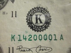 Series 2001 Over inked Serial Number and Federal reserve seal smearing Error.